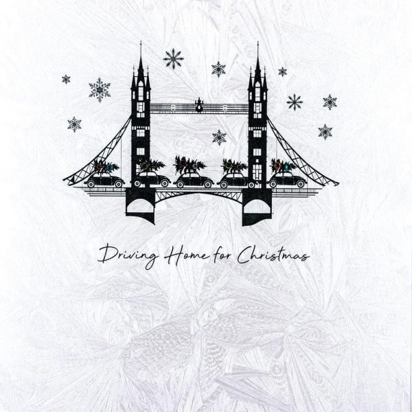 A luxury driving home for Christmas card from Five Dollar Shake. A white cracked ice background with a silhouette image of cars crossing a bridge with black snowflakes and embellished with colourful crystals