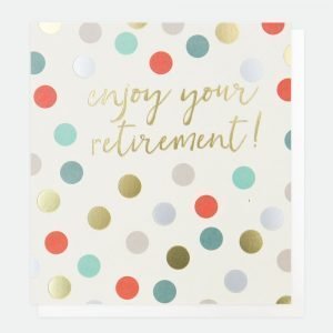 Spotty retirement card. Foiled dots and red blue and pink dots with enjoy your retirement in gold foil
