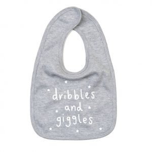 A grey cotton bib printed in grey with dribbles and giggles