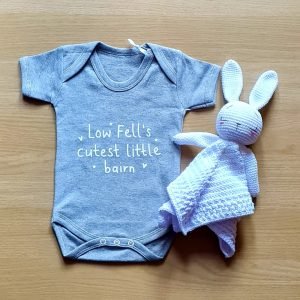 A grey baby vest printed in white with Low Fell's cutest little bairn.
