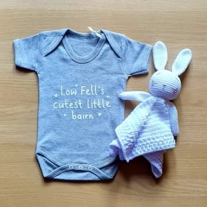 A grey baby vest printed in white with Low Fell's cutest little bairn.