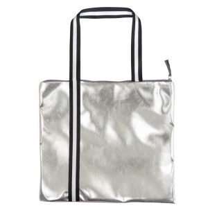 A shopper bag in coral velvet and faux silver and a black and white handle. The lining is teal sateen and a zip fastening