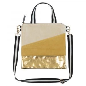 A cross body bag in velvet and gold effect faux leather. Cream and sunshine yellow velvet sections and a gold bottom and back. The bag has two handles, a hand hold and a removable shoulder strap. The handle is black and white. The bag is beautifully lined in grey sateen.