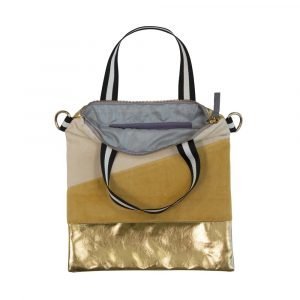 A cross body bag in velvet and gold effect faux leather. Cream and sunshine yellow velvet sections and a gold bottom and back. The bag has two handles, a hand hold and a removable shoulder strap. The handle is black and white. The bag is beautifully lined in grey sateen.