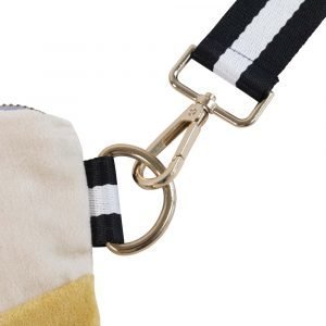 A cross body bag in velvet and gold effect faux leather. Cream and sunshine yellow velvet sections and a gold bottom and back. The bag has two handles, a hand hold and a removable shoulder strap. The handle is black and white. The bag is beautifully lined in grey sateen.