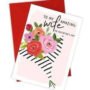 A lovely card with a bouquet of roses design whih has a black and white striped paper around it and the words To My Amazing WIfe on Valentine's day printed on it.