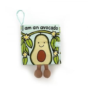 Jellycat soft children's book about an avocado. The book has soft pages with different textures and the avocado has dangly legs that hand down from the book's pages