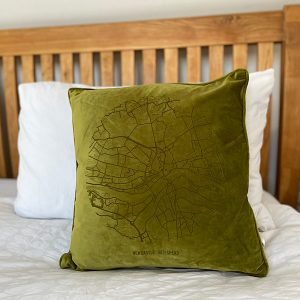 A fabulous bamboo green coloured velvet cushion with a map of Newcastle and Gateshead imprinted on it.