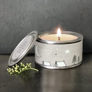 A lovely small tin candle with a lovely label on it and with a label on the lid with the words The Best Memories are made with good friends on great adventures.