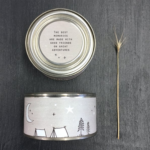 A lovely small tin candle with a lovely label on it and with a label on the lid with the words The Best Memories are made with good friends on great adventures.