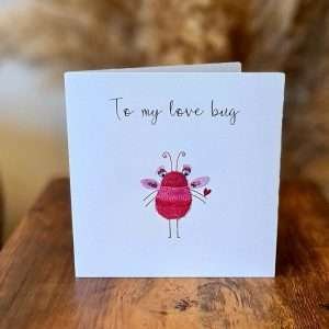 A valentine's day card with a cute little bug and the caption To my love bug