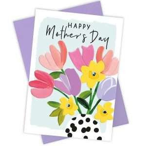 A lovely card with a pale blue background and colourful flowers with a lovely spotty vase.