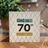 a geordie 70th birthday card. A geometric background with Ged in! it's ya 70th Happy Birthday