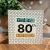 A geordie 80th birthday card. A geometric background with Ged in! it's ya 80th Happy Birthday
