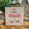 A card with a pink background with best Mam in Low Fell