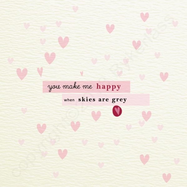 a card covered in little pink hearts and you make me happy when skies are grey printed over the top