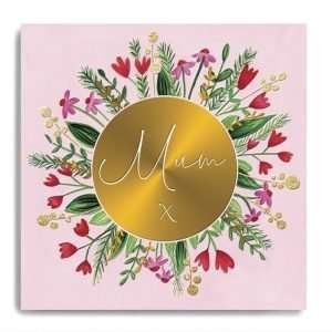 A pink square mother's day card with flowers radiating from a big gold foil disc with Mum x on the disc and gem embellishments