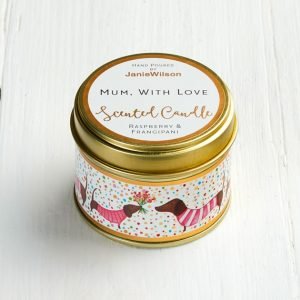 A raspberry and frangipani mini scented candle in a tin decorated with little daschund dogs and Mum with love