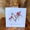 Happy Valentine's Day Card. A floral design with a wooden cut out heart