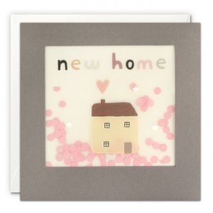 A New Home card with a simple house surrounded by small white stars, with a pink heart above the chimney. The message on the front reads 'new home' in colourful letters. The image is printed on translucent paper, showing pink paper confetti dots behind. The confetti moves around when you shake the card.