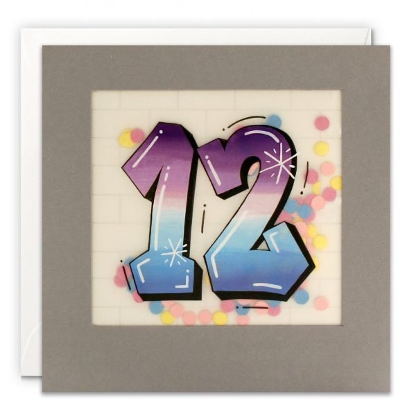 An age 12 card with the number 12 in a colourful graffiti art style, with a pale brick wall in the background. The number is printed on translucent paper, showing colourful paper confetti dots behind. The confetti moves around when you shake the card.
