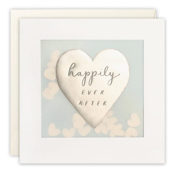 A wedding card with a large silver foiled heart, with the words 'Happily Ever After' written inside it, on a pale blue background. The image is printed on translucent paper, showing confetti paper hearts behind. The confetti moves around when you shake the card.