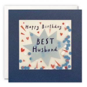 A Husband birthday card featuring an exploding star image with 'Happy Birthday Best Husband' printed in the middle of the star. The image is printed on translucent paper, showing cream paper confetti dots behind. The confetti moves around when you shake the card. The card is blue