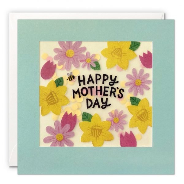 A Mother's Day card with an image of pink and yellow flowers with a bumble bee with "Happy Mother's Day" printed over the top. Printed on translucent paper with colourful dots confetti behind