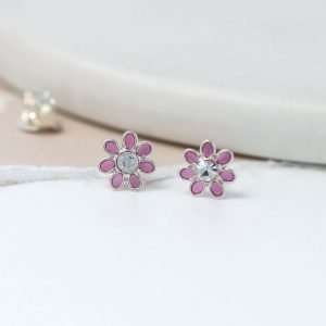 A pair of pink mini flower studs with crystal inset in the centre