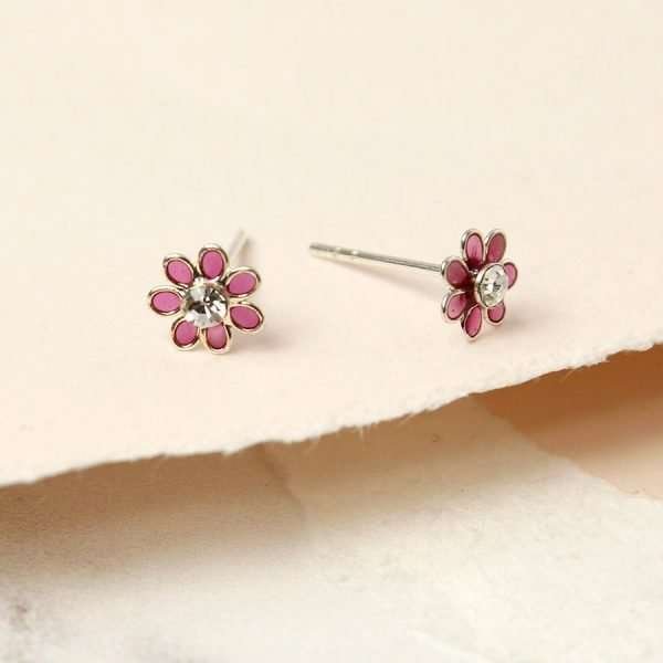 A pair of pink mini flower studs with crystal inset in the centre
