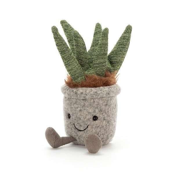 Jellycat silly succulent aloe soft toy. A little grey felt plant pot with a smiley face and little legs. The aloe vera plant isknittedand looks like hair