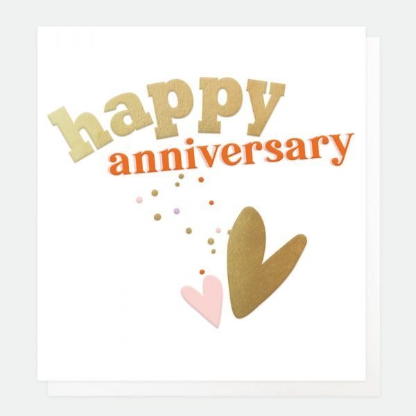 An anniversary card with 2 hearts one gold the other pink and happy anniversary in bold embossed text
