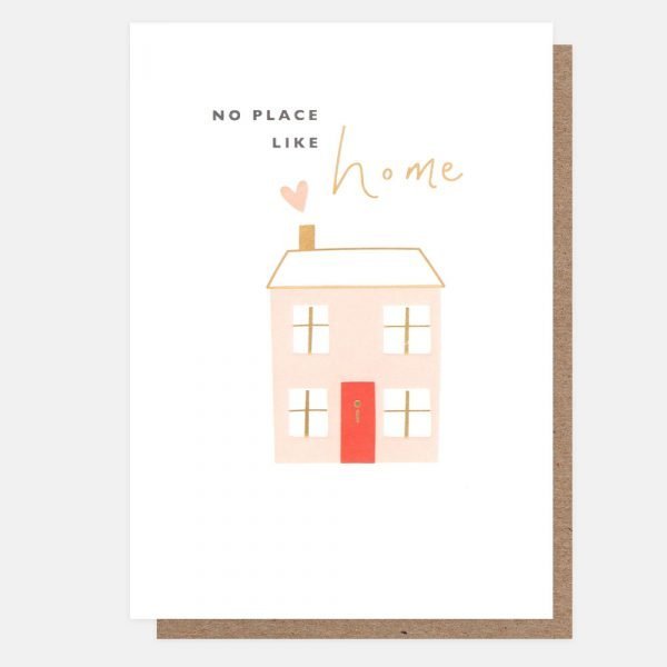 A new home card with a pink house with a red door and gold foil highlights. "No place like home" printed on the front