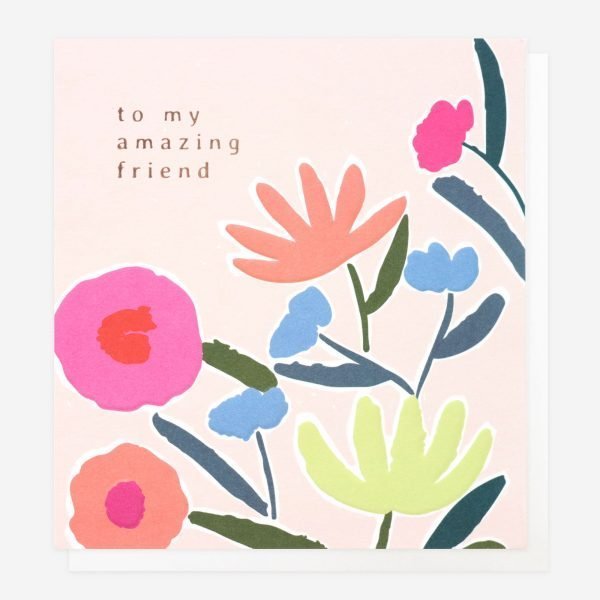 A birthday card with a bright floral design in a painted style on a pale pink background. To my amazing friend in rose gold foil
