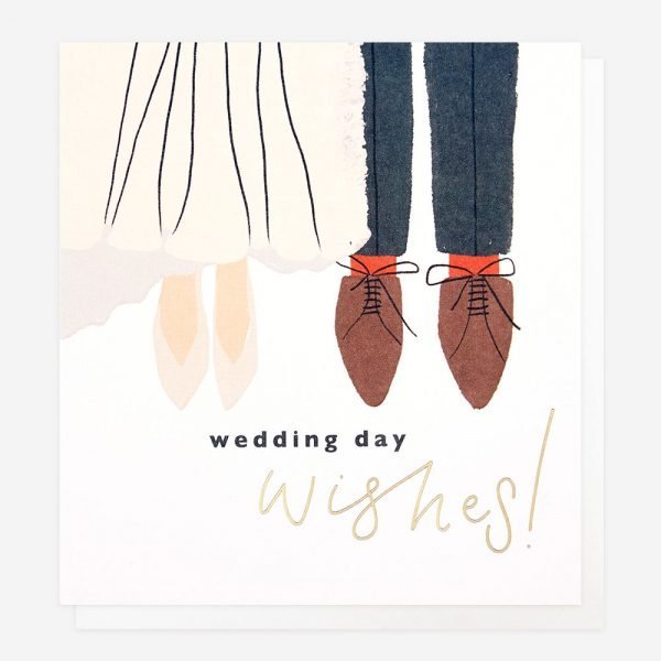 A wedding card with an illustration of the bride and grooms feet and wedding day wishes printed at the bottom of the design