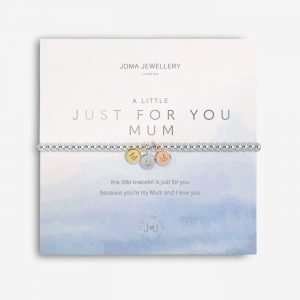 A Little Just For You Mum Joma Bracelet. A silver bracelet with 3 little circular charms in gold rose gold and silver spelling MUM. The bracelet comes presented on a card that reads