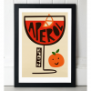 An A3 print with a cream coloured background and a contemporary shaped glass with a smiling orange next to it. The glass has an orange liquid in it and the word Aperol printed in the glass in black.