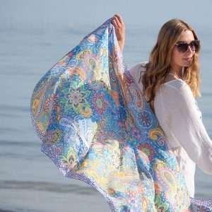 A beautiful paisley silky scarf with aqua and blue tones.