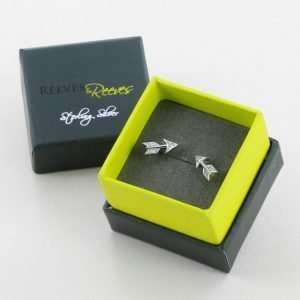A gorgeous pair of sterling silver arrow stud earrings with cubic zirconia stones encrusted in them.