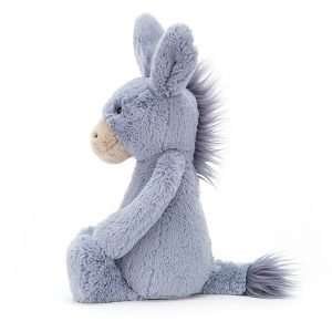 A cute blue grey bashful donkey from Jellycat. He has tall ears and a fluffy mane with a cream coloured snout.