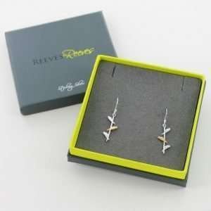A stunning pair of sterling silver earrings with a long stick with three little birds on them. The middle bird is gold plated.