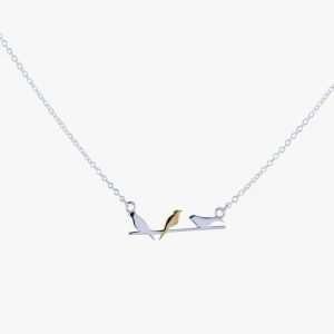 A beautiful Bird on a wire necklace with sterling silver link chain. The three birds are sterling silver with one of the birds detail in gold plating.