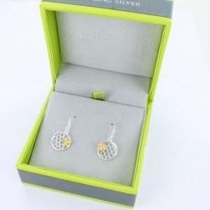 A special pair of sterling silver honeycomb design earrings with a hook fastening and little gold plated bee design.