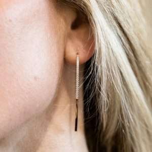 A beautiful pair of long line sterling silver hook earrings with a lovely cubic zirconia stone effect.