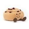 A sweet cuddly amusable pain au raisin with little brown corduroy legs and a smiley face.