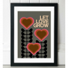 A lovely print from East End Prints. With a grey background and three flowers that are in the shape of hearts and the words Let Love Grow are printed in a pale pink print.
