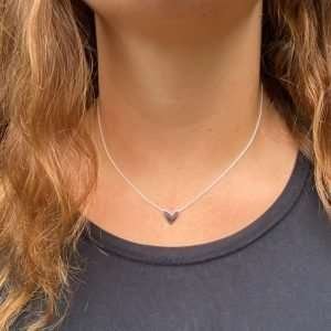 A gorgeous sterling silver chain necklace with a silver heart pendant.