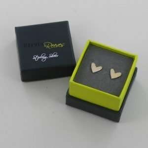 a lovely pair of sterling silver heart shaped cariad stud earrings
