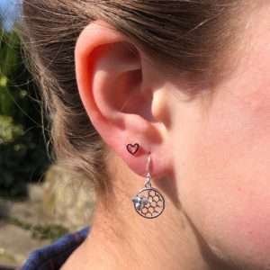 A special pair of sterling silver honeycomb design earrings with a hook fastening and little gold plated bee design.
