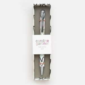 A white pen with outline hearts decoration presented in a matching gift box